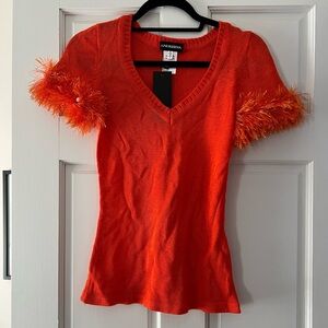 Andreeva poppy knit top with handmade details and pearls